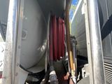 an image of a truck with a tank on the back of it
