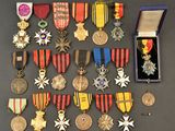 many medals and medals on display on a table