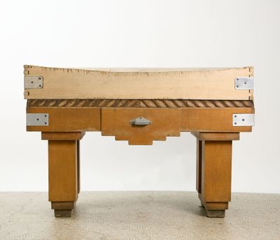 an image of a wooden table with a drawer underneath it