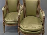 pair of french louis xvi style armchairs with green velvet upholstered seats
