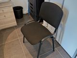 a chair that is sitting in the corner of a room