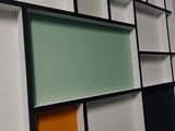 a picture of a wall with many different colored squares on it