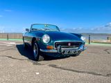 an image of a classic car parked in a parking lot