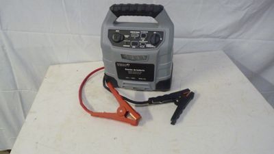 an image of a car jump battery charger on a table
