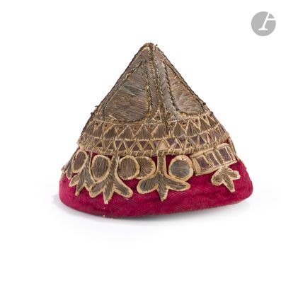 an image of a red and gold hat on a white background