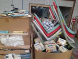 a pile of chairs and other items in a box