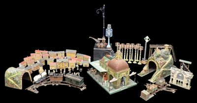 a lot of miniature buildings that are on a black background
