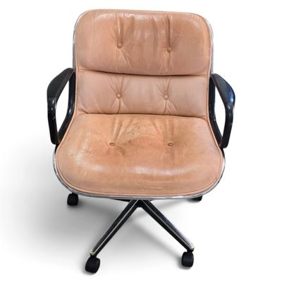 an image of a brown leather office chair with black metal legs