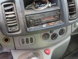 a dashboard of a car with various electronics in it