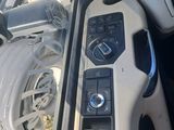 a picture of a car dashboard with a steering control
