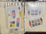 a lot of stamps on the inside of a suitcase