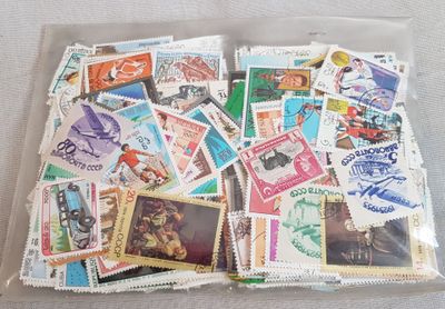 many different stamps in a plastic bag on the table