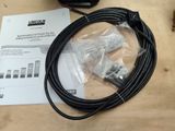 an image of a couple of cables sitting on top of a table