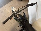 a motorcycle that is sitting on the floor in the room
