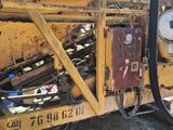 an image of a machine that is working on the ground