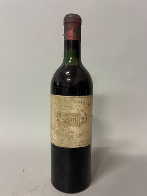 a bottle of wine that is sitting on a table