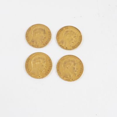 quatre souverains d'or, dont l'un représente une tête et l'autre une couronne