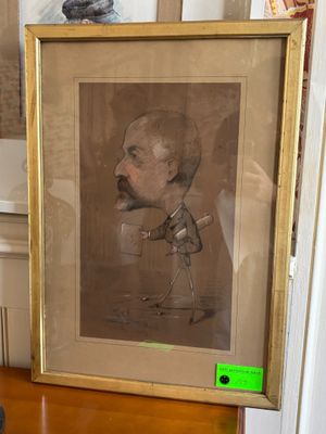 a picture of a man with a mustache on a table
