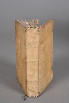 an old book that is sitting on a table