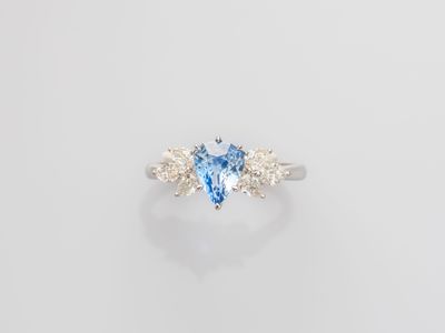 a blue topaz and diamond ring