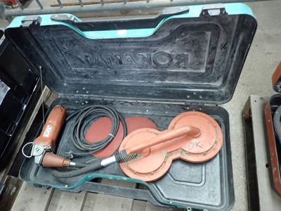 an open suitcase with a hose and a hose in it