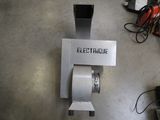 a toilet paper dispenser with a roll of toilet paper attached to it