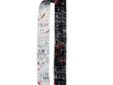 a black and white neck tie with a red design on it