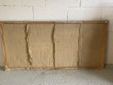 a picture of a piece of cardboard taped to a wall