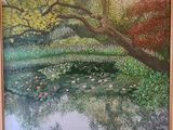 un tableau représentant un étang avec des nénuphars