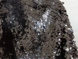 a black and silver sequinned dress on a mannequin mannequin mannequin mannequin mannequin mannequin manne