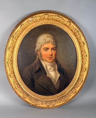 portrait of a man in a brown coat and white shirt in a gold frame