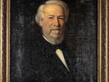 portrait d'un vieil homme en costume noir et nœud papillon