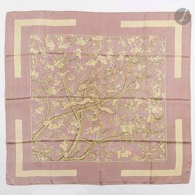 a pink and gold silk scarf with a bird on a branch