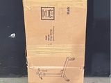 boxes stacked on top of each other on the ground