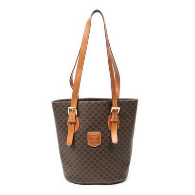 a brown and tan tote bag with a brown handle