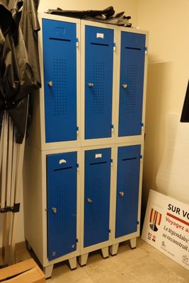 a picture of a locker in a room with blue lockers