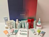 the contents of a beauty box are displayed on a table