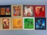 six different colored paintings of a woman and a child on a wall