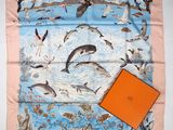 silk scarf with a picture of dolphins, seagulls, and seagulls on it
