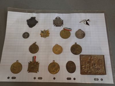 a sheet of paper that has a bunch of medals on it