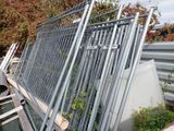 a metal fence that has been placed on top of a building