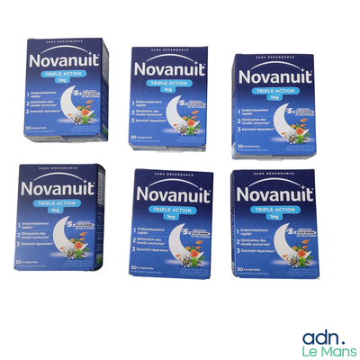 Quatre boîtes de Nownut sont posées les unes à côté des autres sur une surface blanche.