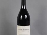 a bottle of wine that is sitting on a table
