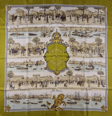 an image of a yellow and white scarf with a picture of a city