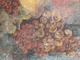 a painting of a bunch of grapes on a table