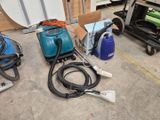 many different types of vacuums and other equipment on the floor