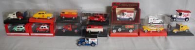 a lot of toy cars and trucks in a display case