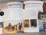 an open book with pictures of people riding on horses