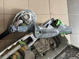 a picture of a corded sander and other tools on a tiled floor