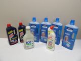 many bottles of cleaning products sitting on a counter